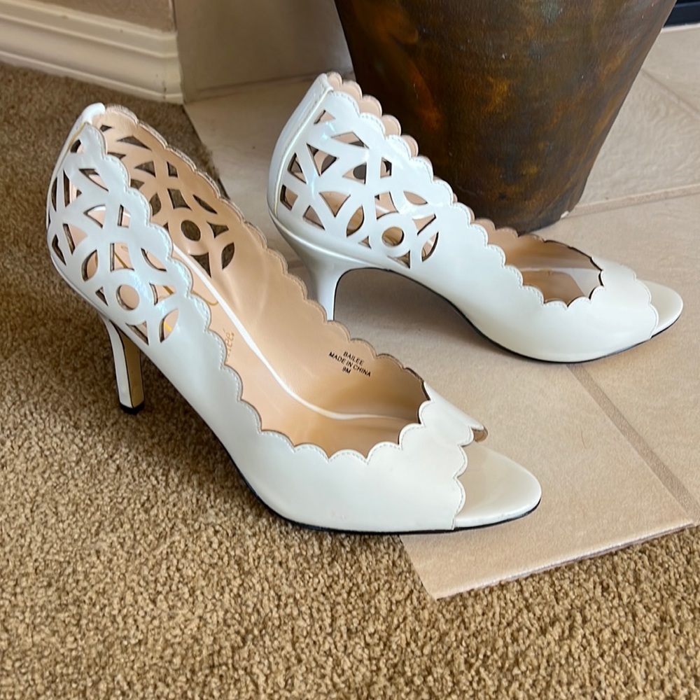 J. Renee white cutout pumps. Only worn once, very stylish and comfortable.